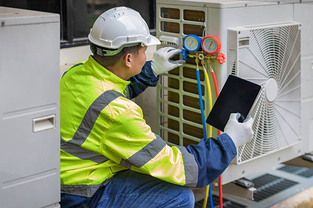 Professional Heat Pump Repair technician working in Jarvisburg, NC
